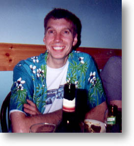 Alan wearing overnight leader's shirt
